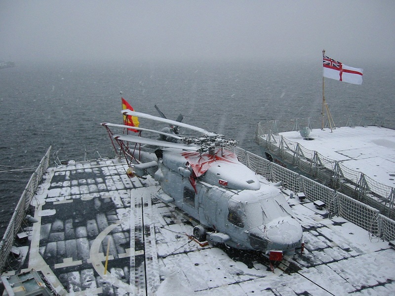SH-60B on a flight deck covered in snow